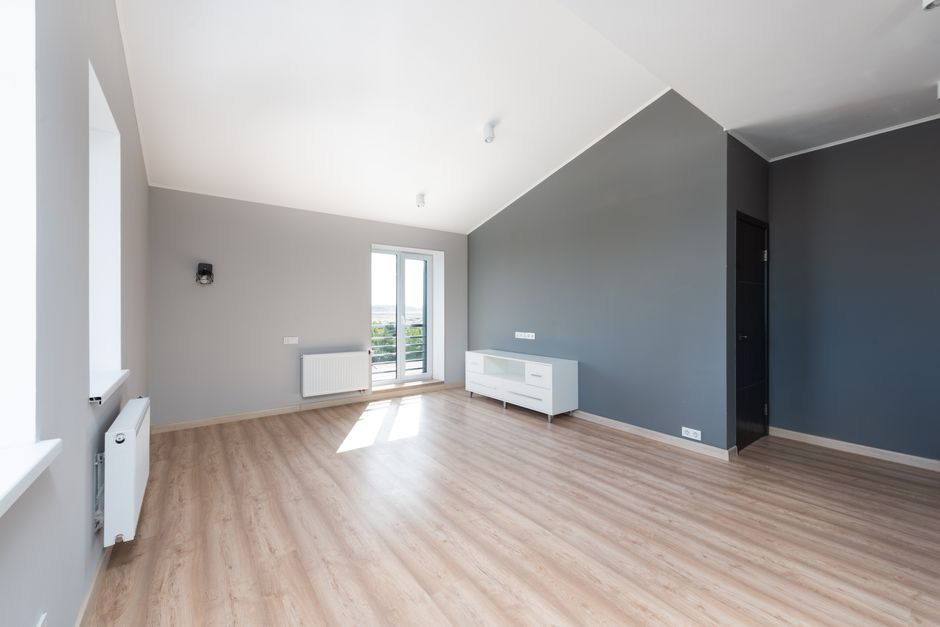 Finished living room repaint in two-tone gray